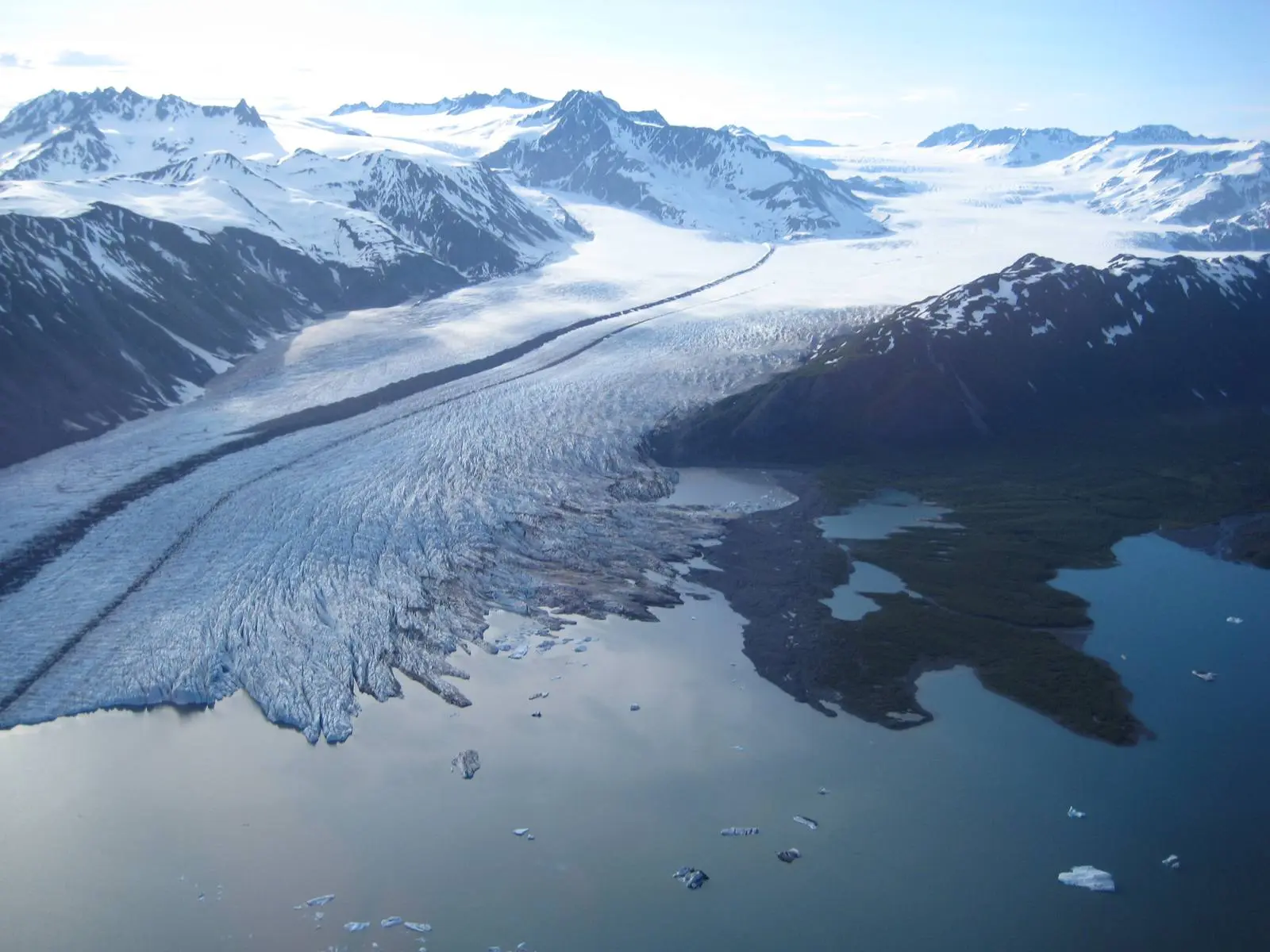 Bear Glacier runs off the Harding Icefield into its iceberg lagoon, Kenai Fjords National Park, 2008.