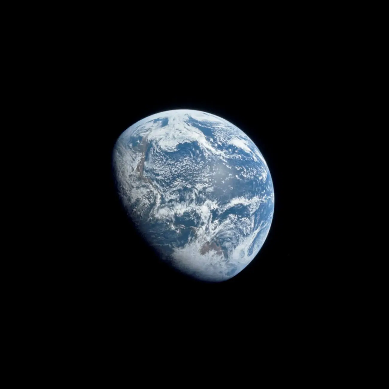 The Earth from Apollo 8, with the line between day and night crossing the Americas (AS08-16-2596)
