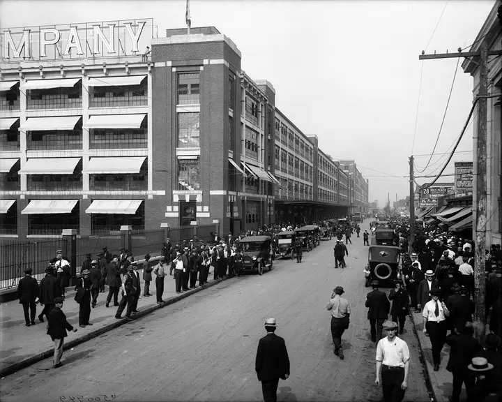 Shift change at the Ford Motor Company plant, 1910s.