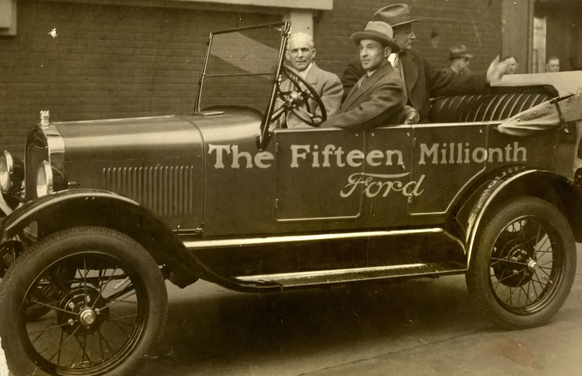 Henry Ford at the wheel of the fifteen millionth Model T, with Edsel Ford beside him, 26 May 1927.