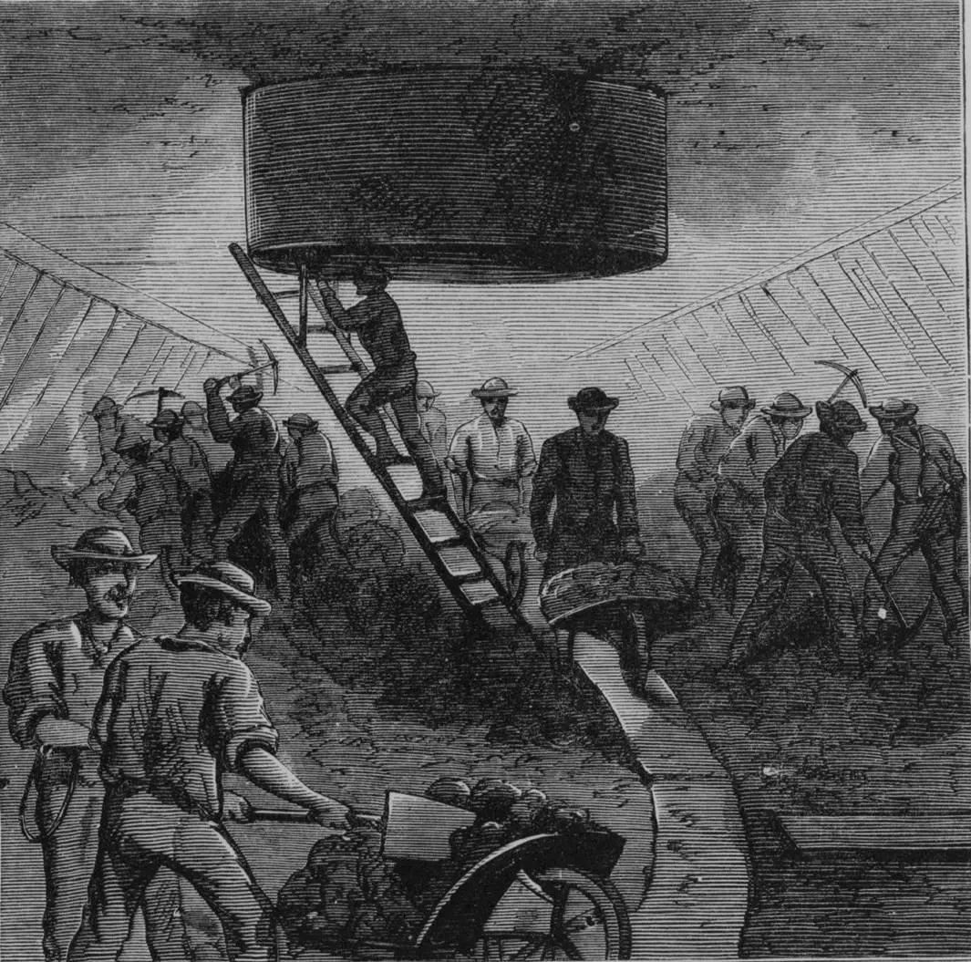 Sandhogs at the foot of the supply shaft inside the Brooklyn caisson, under the East River, 1870.