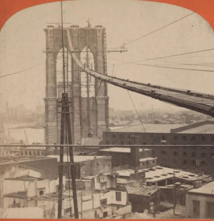 The workers’ footbridge climbing to a finished tower during the cable work.
