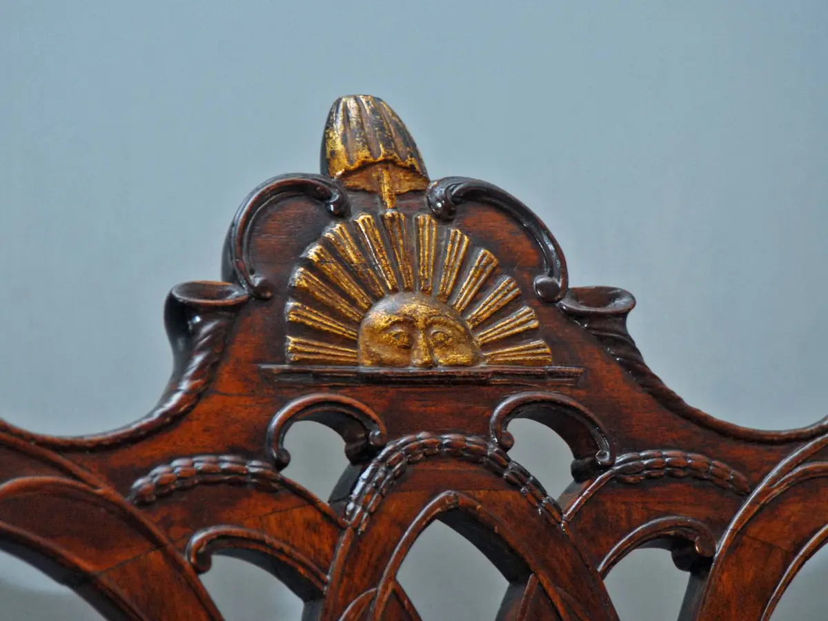 The carved half sun on the back of Washington's chair. On the last day Franklin decided it was a rising sun.