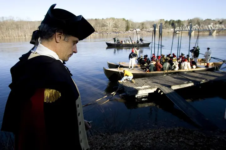 Reenactors cross the Delaware at Washington Crossing, as they do every Christmas Day.
