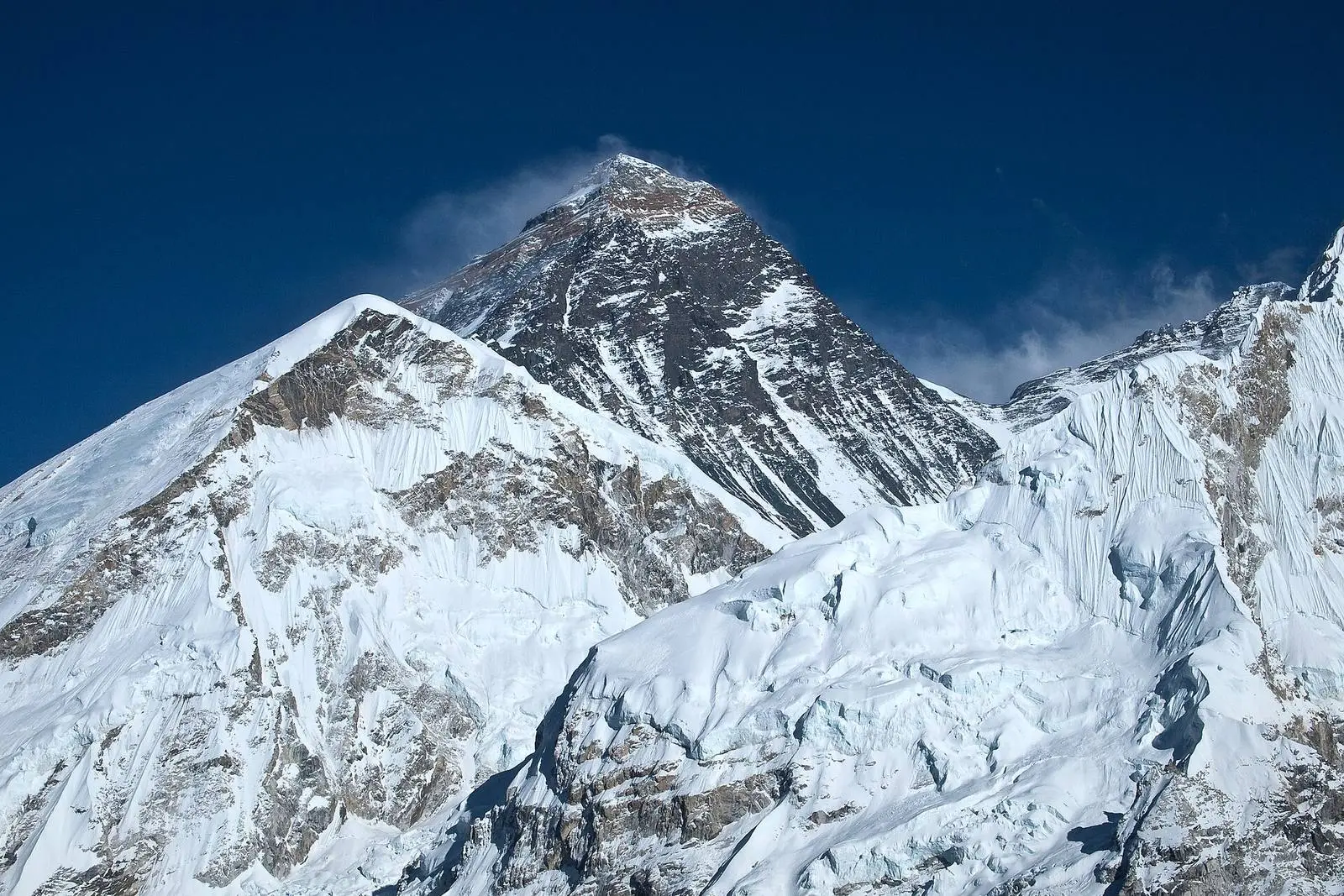 Mount Everest from the Khumbu in Nepal, the side the 1963 team climbed, with a plume of snow streaming off the summit.