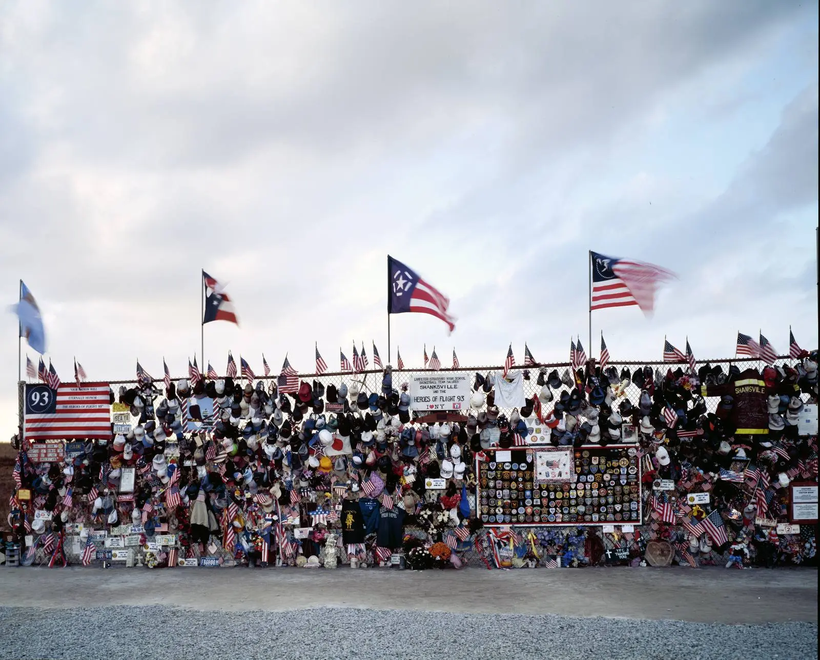 Flags and tributes from all over the country at the first, temporary memorial near Shanksville
