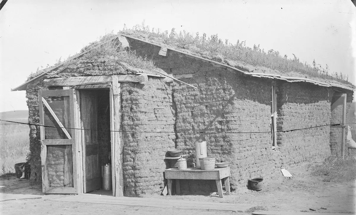 The old Mitchell ranch sod house in Custer County, Nebraska, photographed by Solomon Butcher on 4 August 1888.