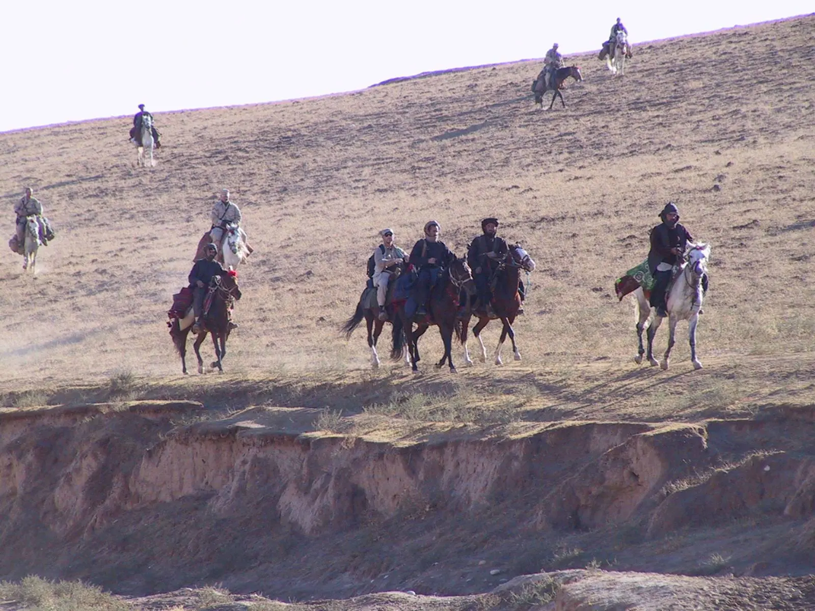 Green Berets of Task Force Dagger ride with General Dostum’s horsemen in the Darya Suf valley, northern Afghanistan, autumn 2001