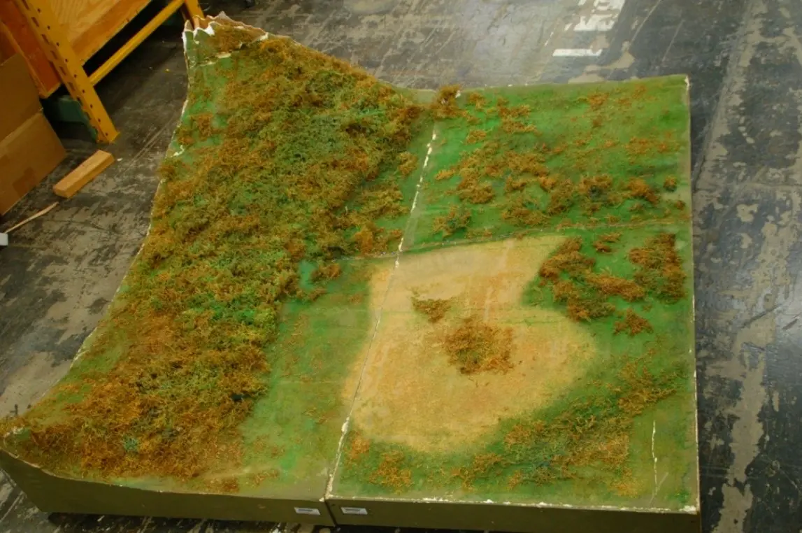 An Army training terrain board of LZ X-Ray and the ground around it, built in two sections, each 36 by 72 inches.