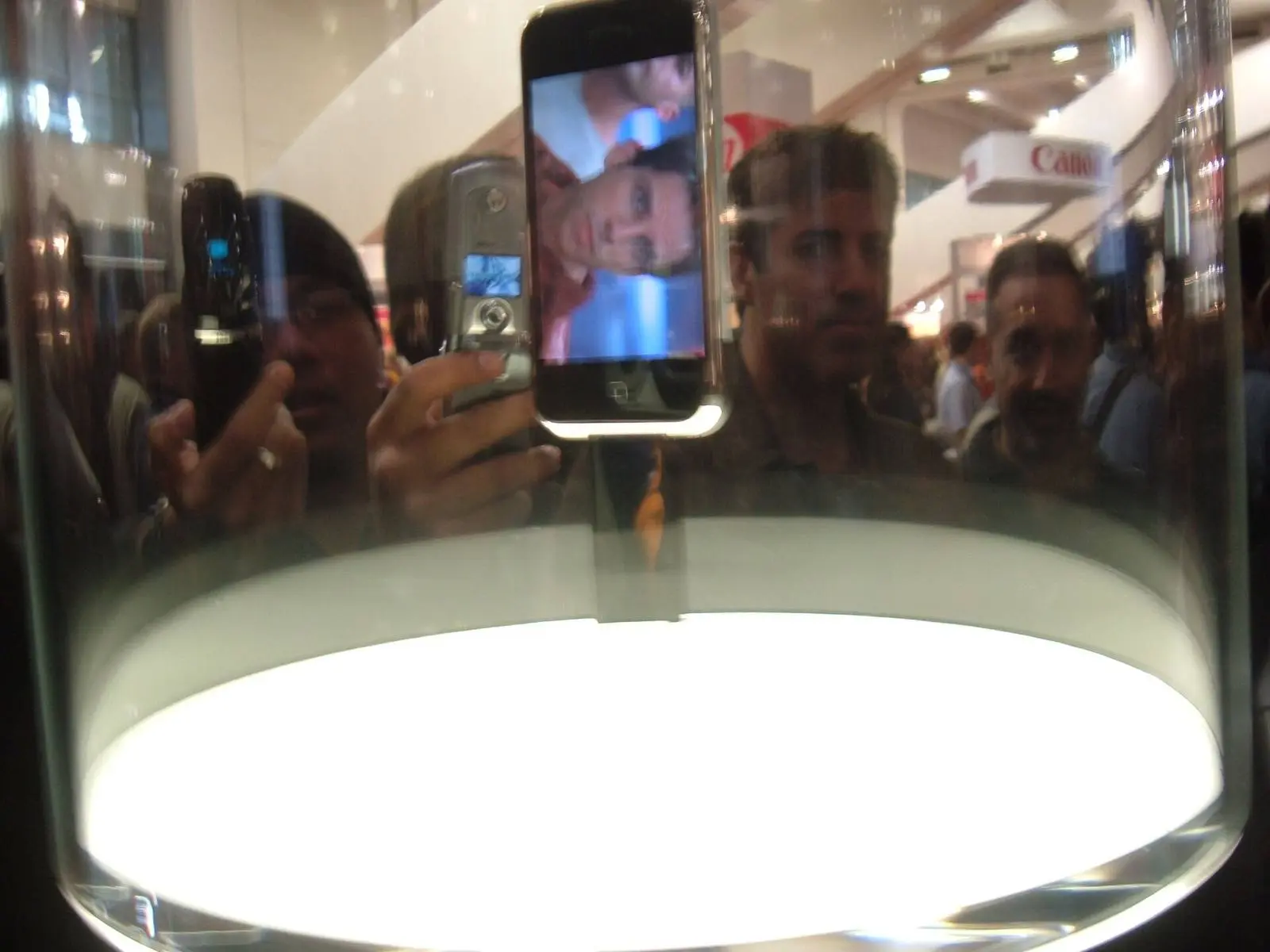 The iPhone on public display for the first time, under a glass dome at Macworld, 9 January 2007