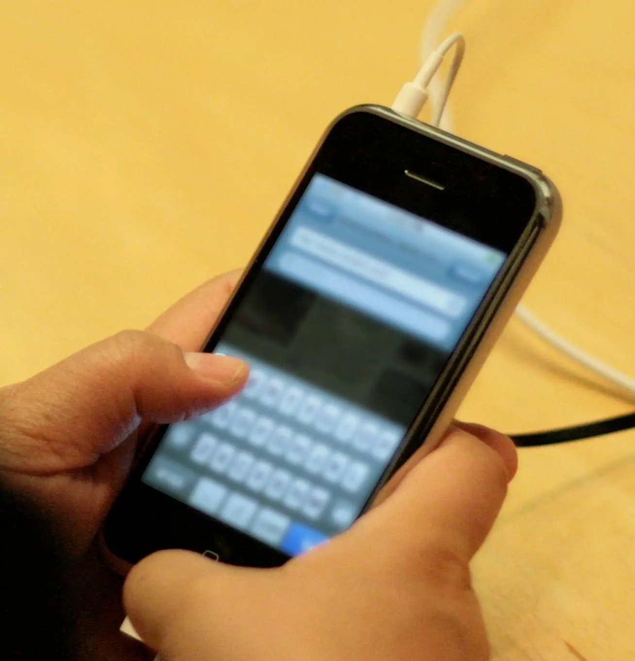 Typing on the iPhone’s glass keyboard on launch night in Seattle, 29 June 2007