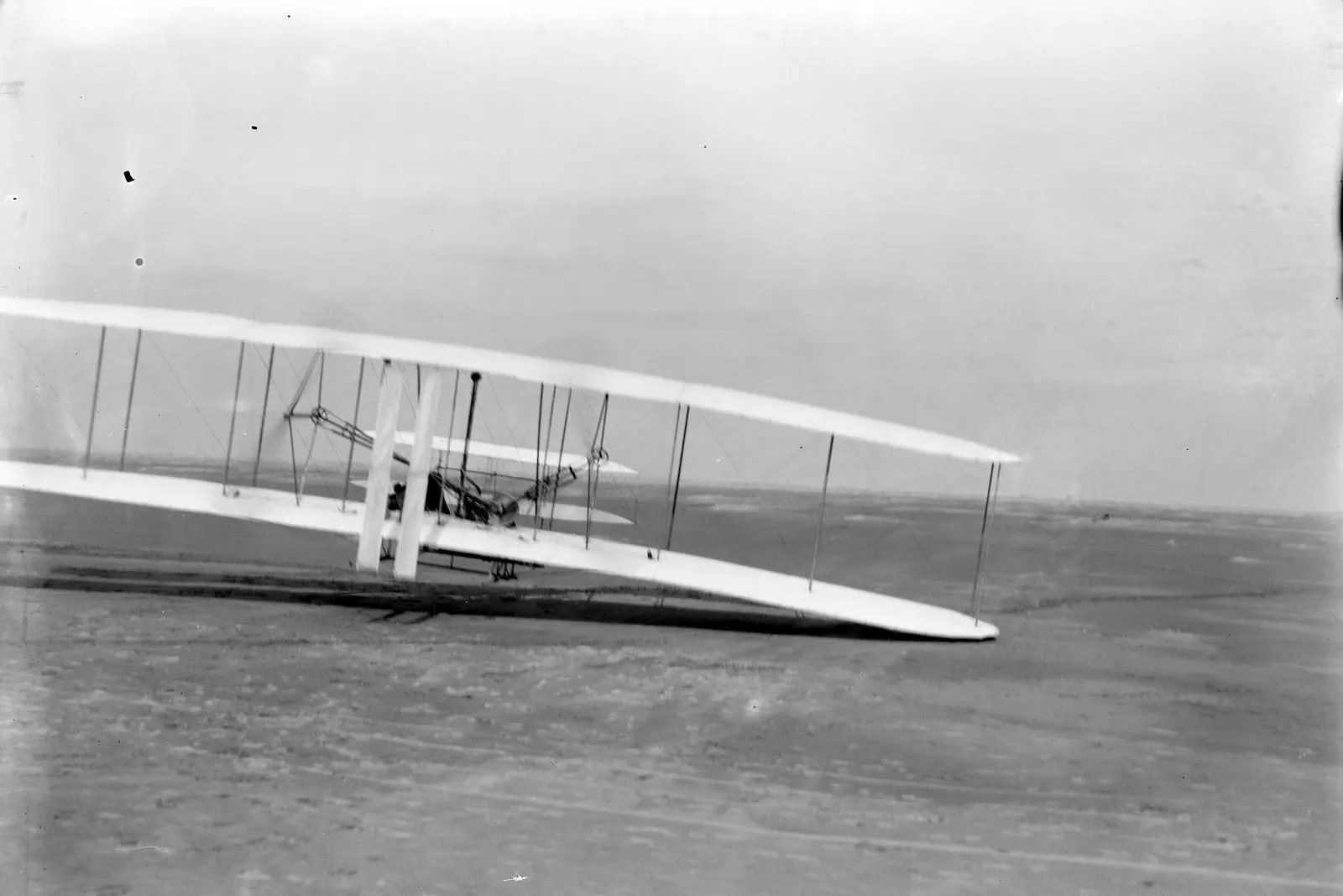 Orville Wright pilots the third flight of December 17, 1903, at Kill Devil Hills, N.C.