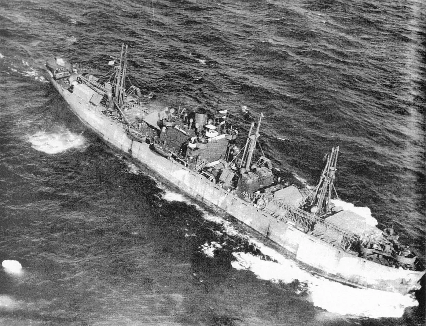 The SS John W. Brown heads out to sea with a deck cargo after her conversion to a troopship, about 1943.