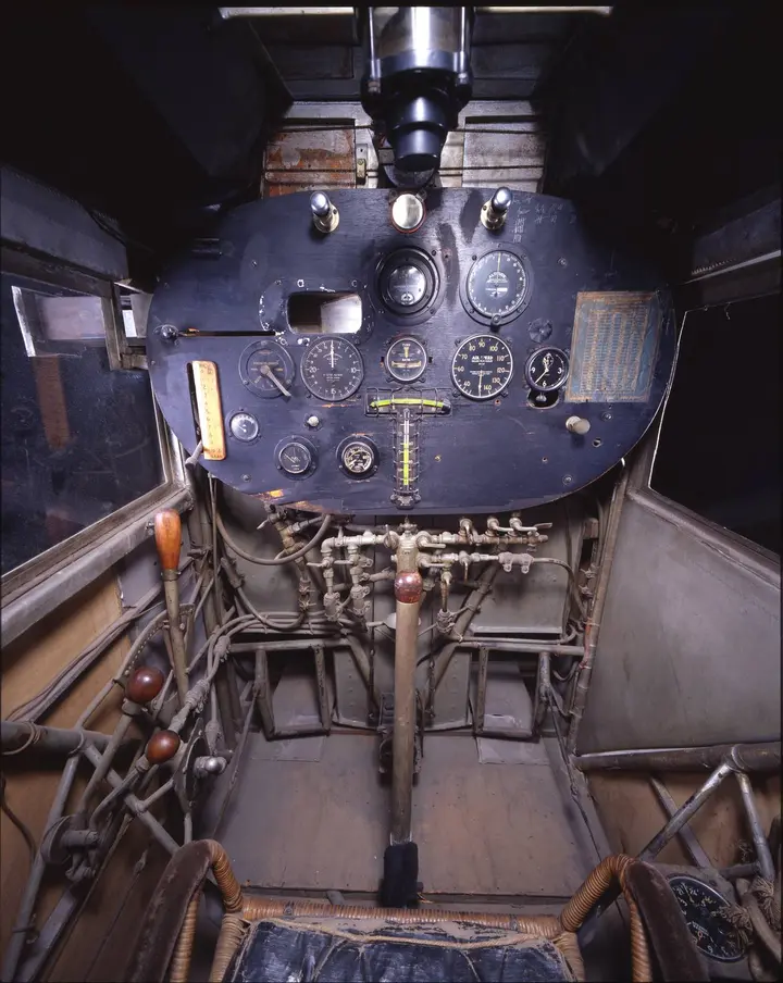 Looking forward from the pilot's seat: instruments, and behind them the fuel tank. There is no front window.