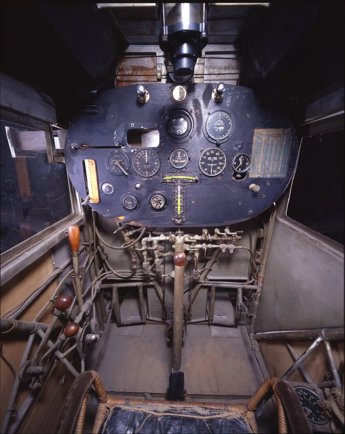 Looking forward from the pilot's seat: instruments, and behind them the fuel tank. There is no front window.