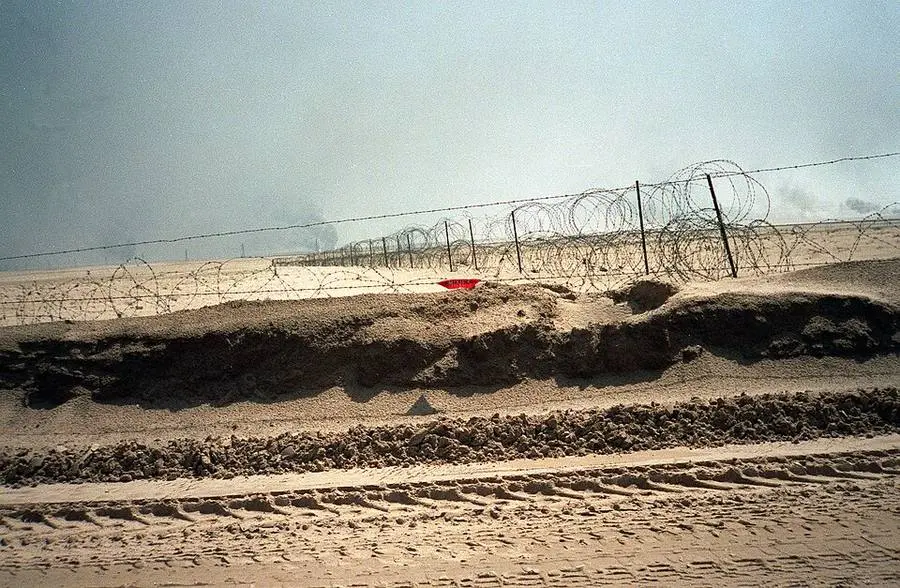 Iraqi wire and berms on the Kuwait-Saudi border, breached by the 1st Marine Division on the first day of the ground war.