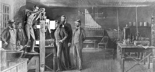 Edison and his staff testing lamps in the Menlo Park laboratory, a period engraving shown in the IEEE REACH video