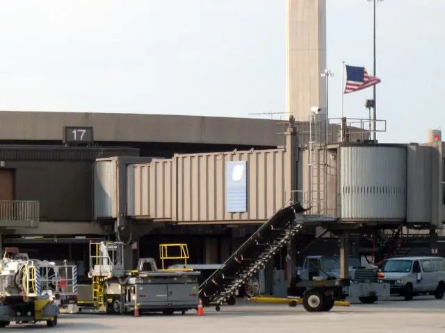A flag flies over Gate A17 at Newark, where Flight 93 pushed back on 11 September 2001