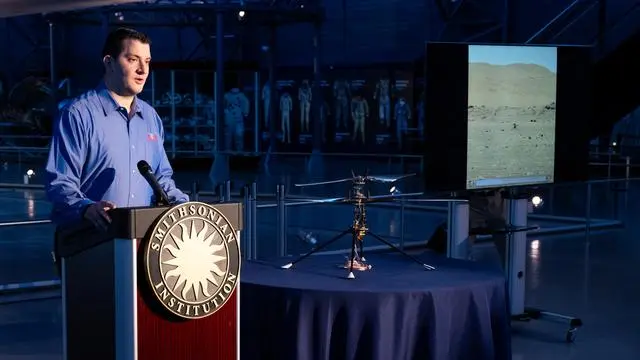 Teddy Tzanetos presents the Ingenuity aerial prototype donated to the Smithsonian's Udvar-Hazy Center, 15 December 2023