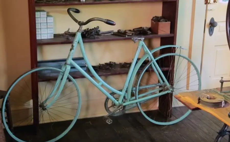 A period bicycle inside the Wright Cycle Company building, now at Greenfield Village, Dearborn, Mich.