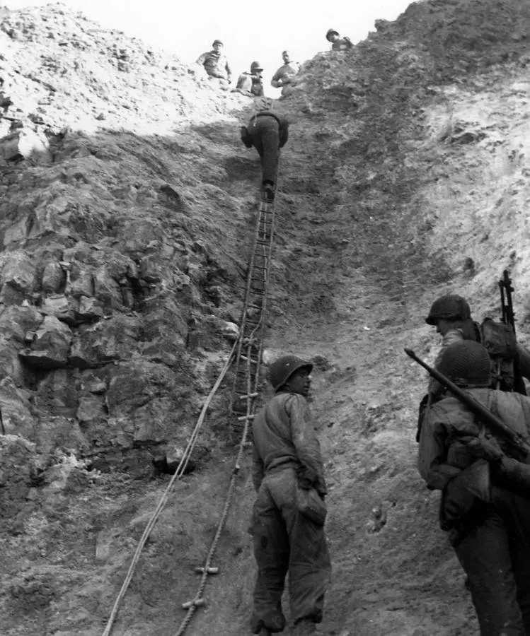 Rangers show the ladders used to scale Pointe du Hoc, June 1944 (80-G-45716)