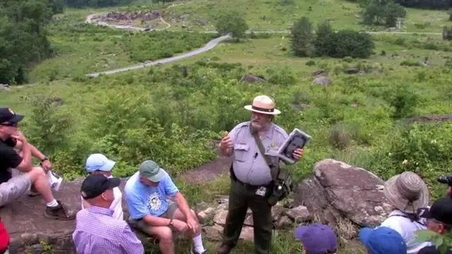 Ranger Chuck Teague leads a program on the slopes of Little Round Top (video thumbnail).