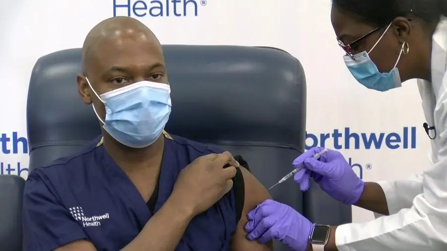 A Northwell Health frontline worker receives one of the first COVID-19 vaccinations, 14 December 2020 (video still).