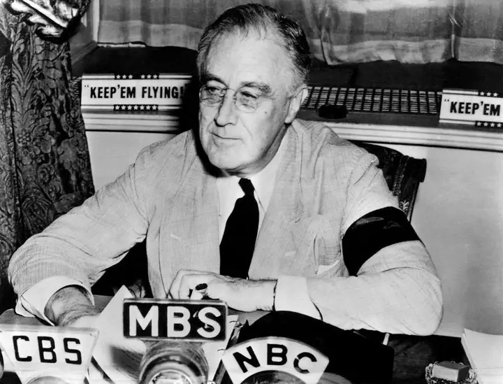 President Roosevelt at the microphones for a national radio address, 11 September 1941
