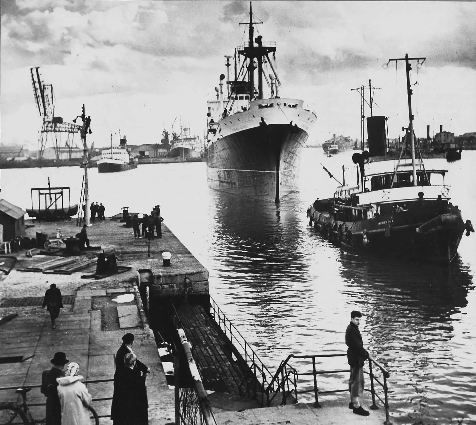 A freighter comes alongside in the harbor at Marseille. Almost destroyed in the war, the port was rebuilt with Marshall Plan aid and was busier than ever.
