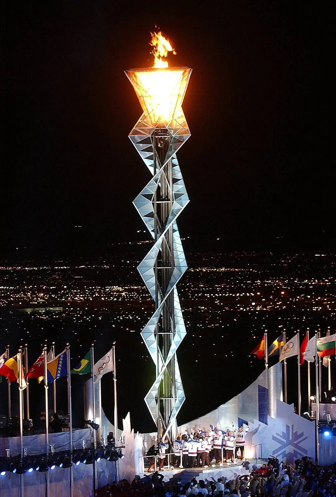 The Salt Lake City cauldron burns after members of the 1980 team lit it to open the 2002 Winter Olympics, 8 February 2002
