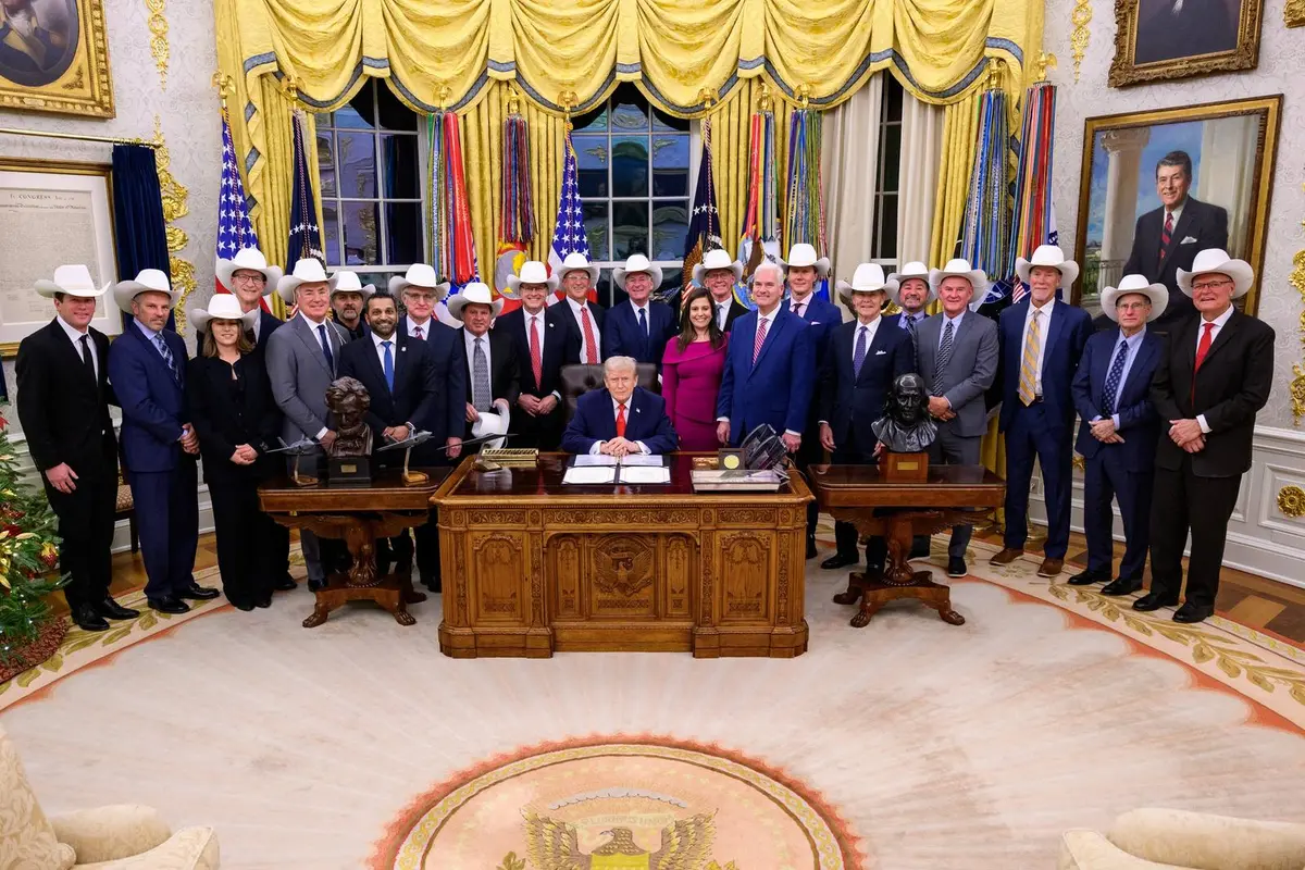 Members of the 1980 team with President Trump in the Oval Office in December 2025, when he signed the Miracle on Ice Congressional Gold Medal Act