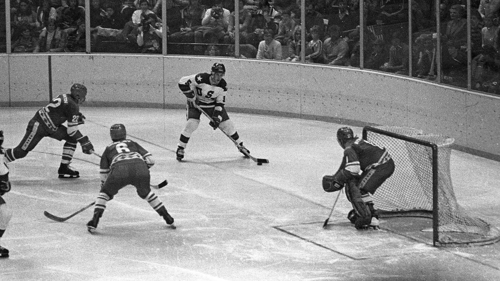 USA against the Soviet Union in the Olympic Field House, Lake Placid, 22 February 1980. Defenseman Mike Ramsey (5) carries the puck in the Soviet zone