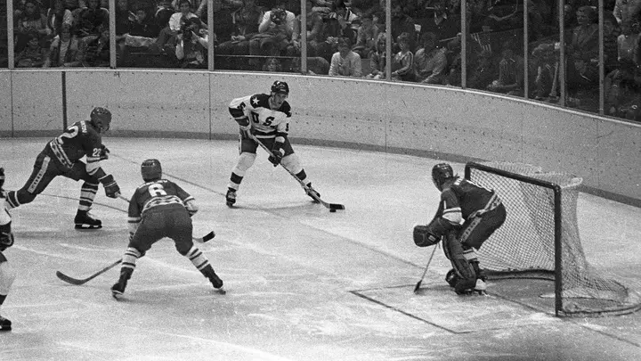 USA against the Soviet Union in the Olympic Field House, Lake Placid, 22 February 1980. Defenseman Mike Ramsey (5) carries the puck in the Soviet zone