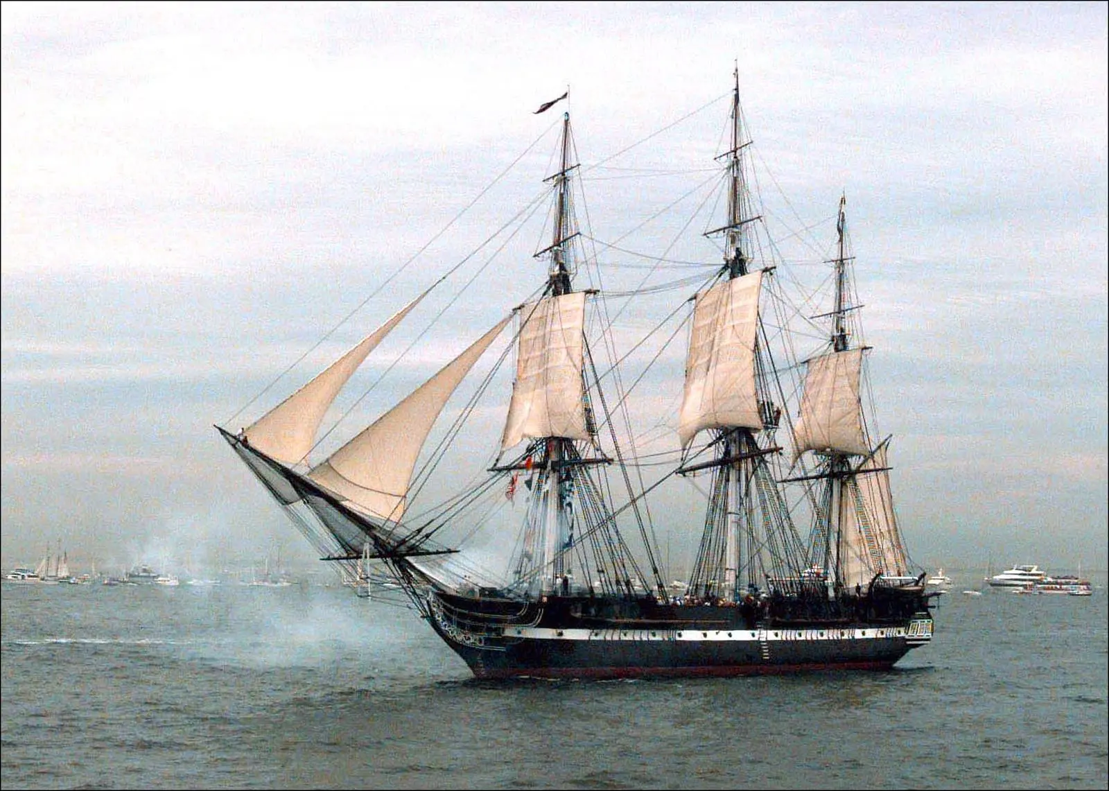 Constitution fires her starboard guns under sail on 21 July 1997, sailing on her own for the first time in 116 years.