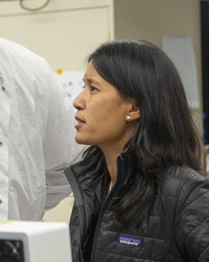 MiMi Aung, Mars Helicopter project manager, watches a flight test in JPL's Space Simulator, 18 January 2019