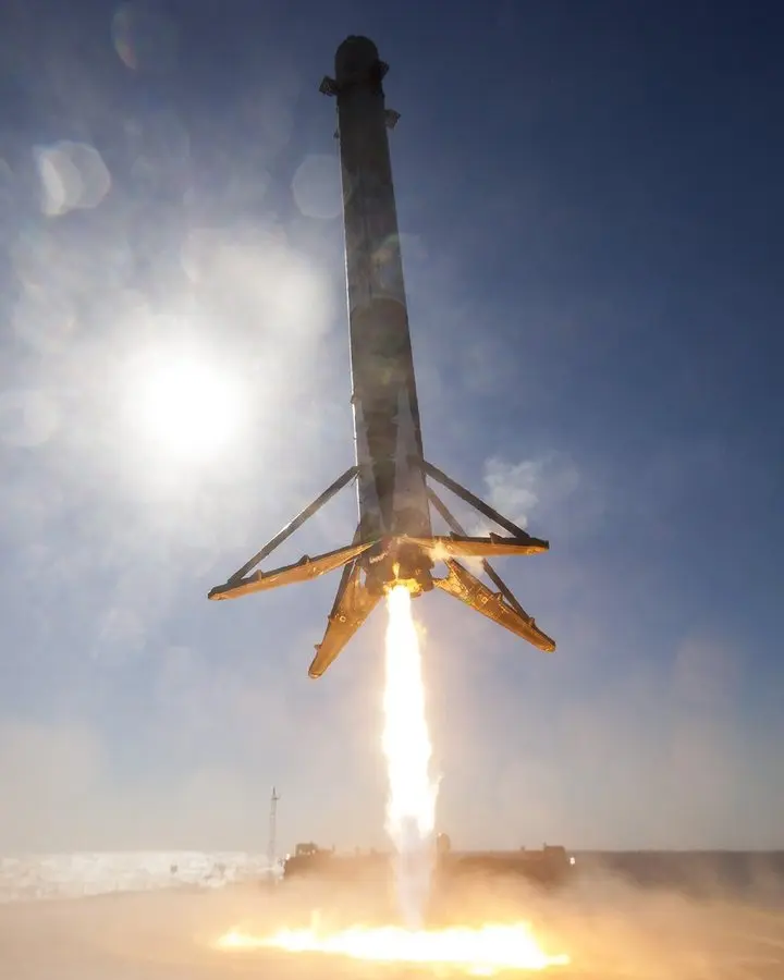 A Falcon 9 first stage fires its engine to land on the drone ship Of Course I Still Love You, the landings Lars Blackmore’s team made work. No free portrait of Blackmore is available.