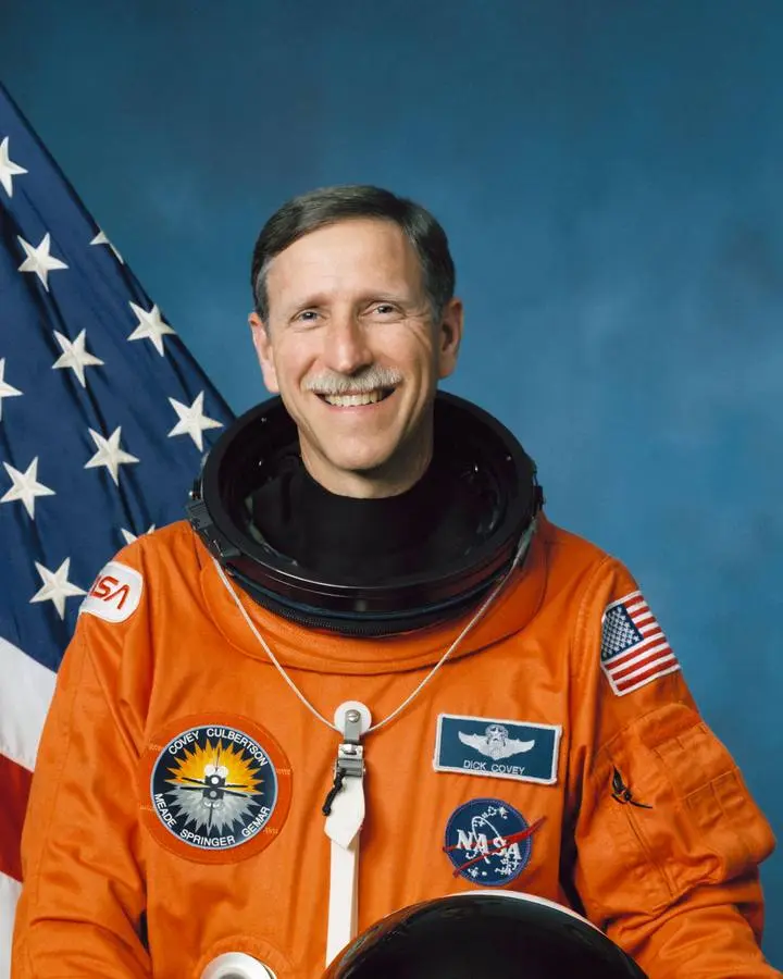Official NASA portrait of astronaut Richard O. Covey, commander of STS-61.