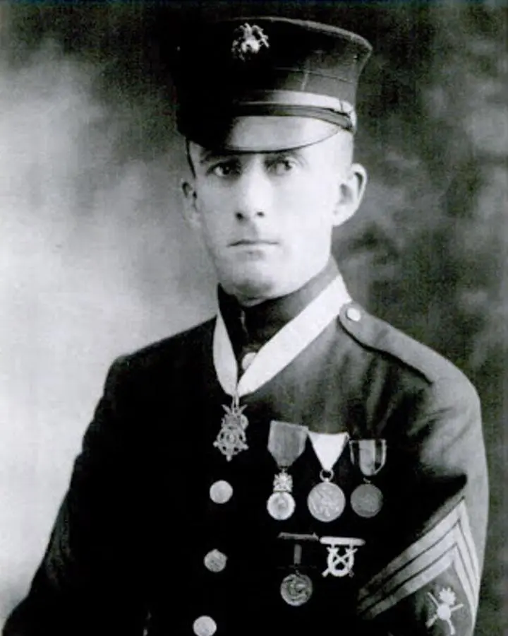 Gunnery Sgt. Ernest A. Janson, wearing the Army Medal of Honor at his neck