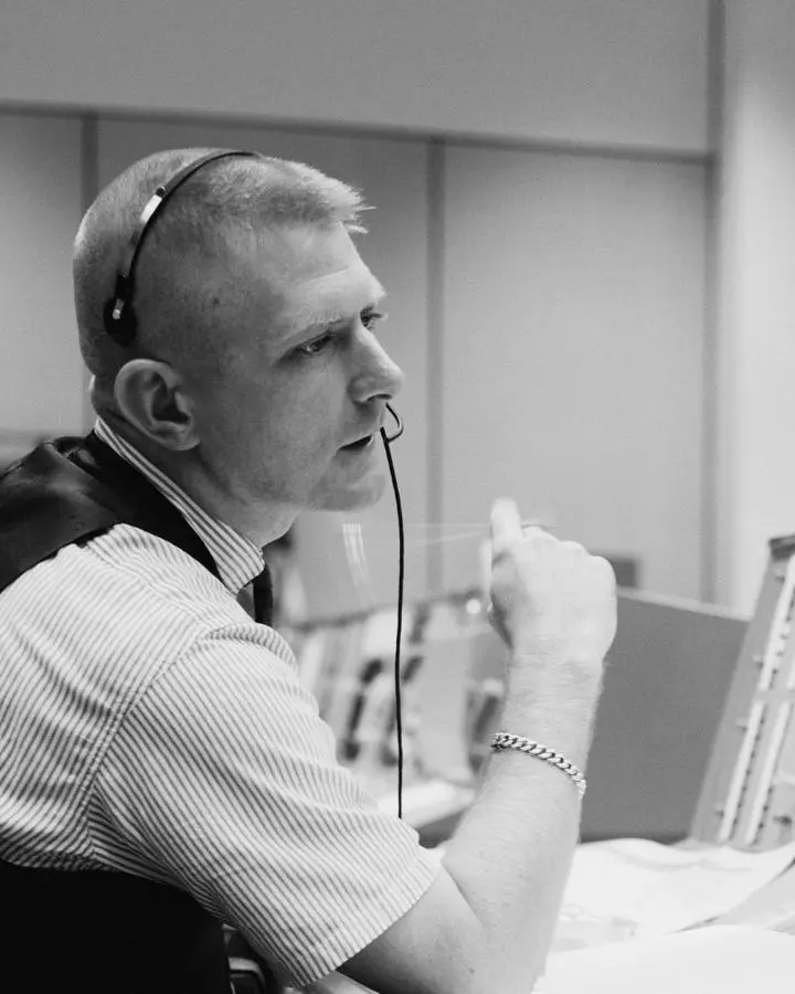 Flight director Gene Kranz at his console in Houston's Mission Control during a Gemini 4 simulation, April 1965