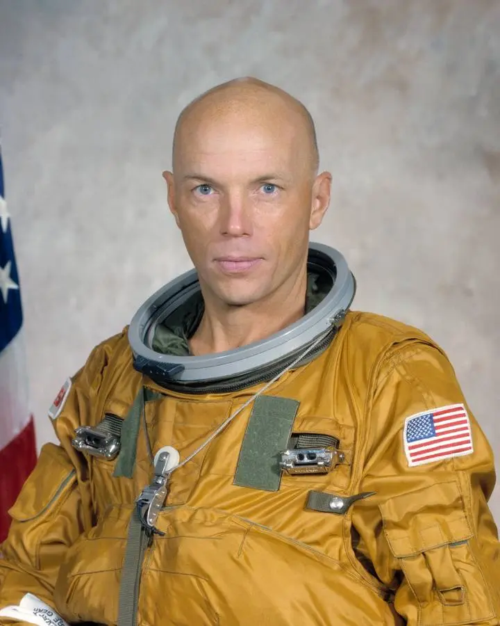 Official NASA portrait of astronaut F. Story Musgrave, Marine Corps veteran, surgeon and STS-61 payload commander (S79-37745).