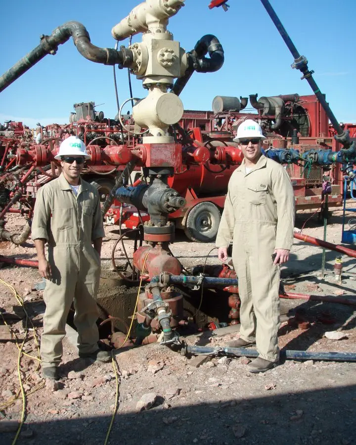 Frac crew members at a wellhead during a fracture job on a Bakken well in North Dakota, 2011. No free portrait of Nick Steinsberger is available.