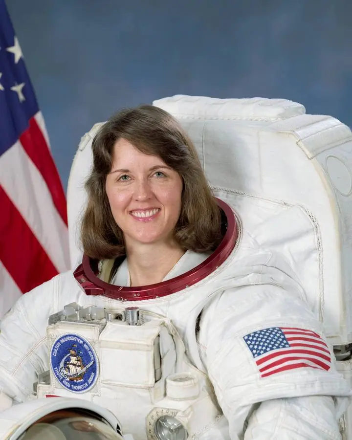 Official NASA portrait of astronaut Kathryn C. Thornton in her spacesuit, 1992.