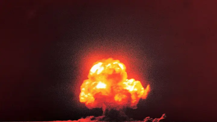 Jack Aeby's color photograph of the Trinity fireball rising over the Jornada del Muerto, 16 July 1945.